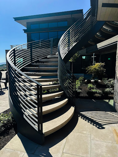 Exterior curved spiral staircase — Promontory Club Park City