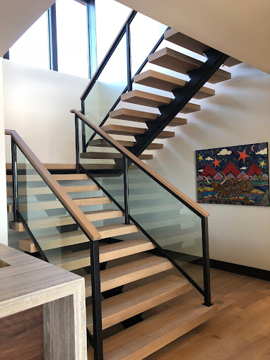 Dramatic interior spiral staircase — Deer Valley Utah