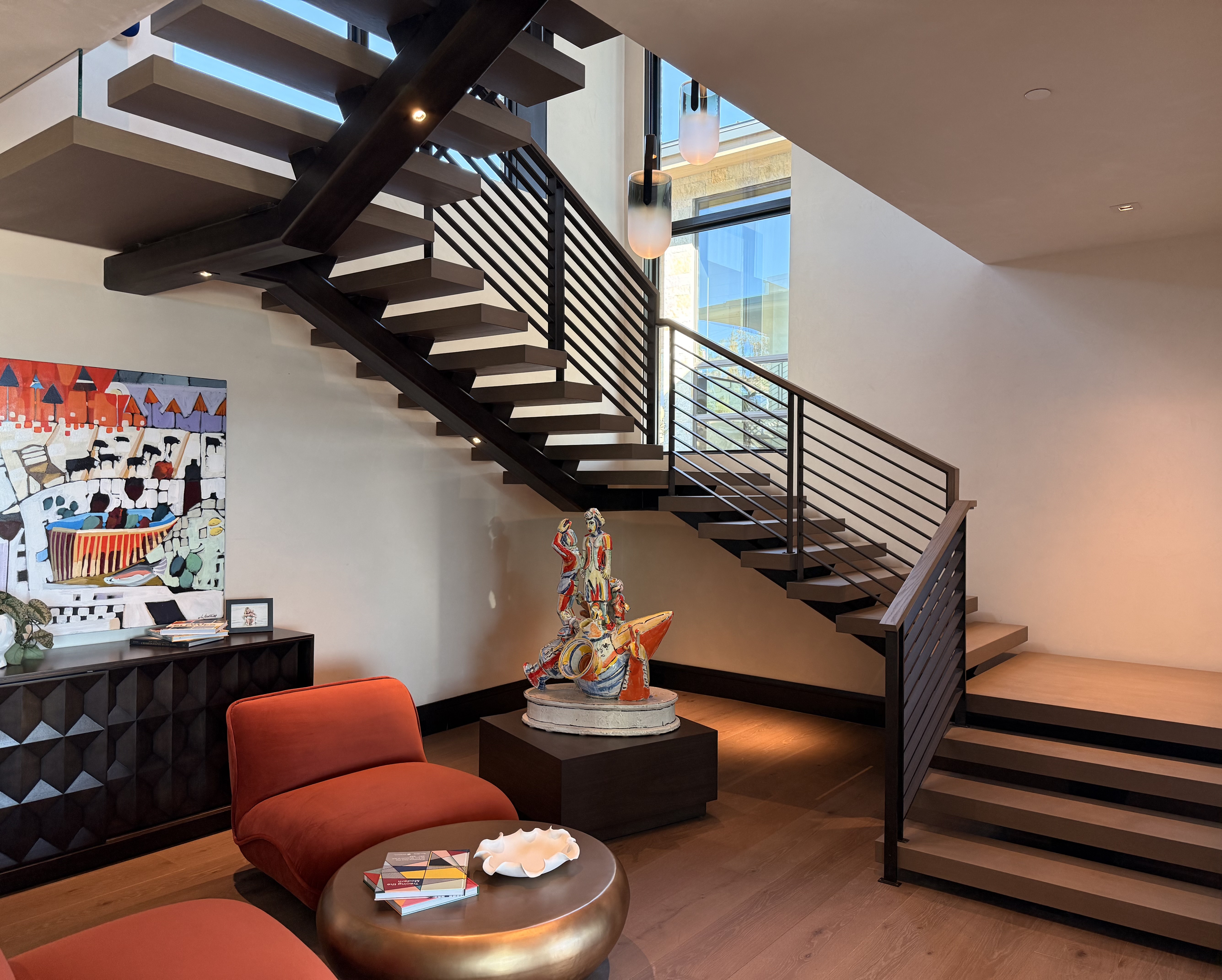 Custom floating staircase with horizontal steel railings — ultra-luxury Utah residence